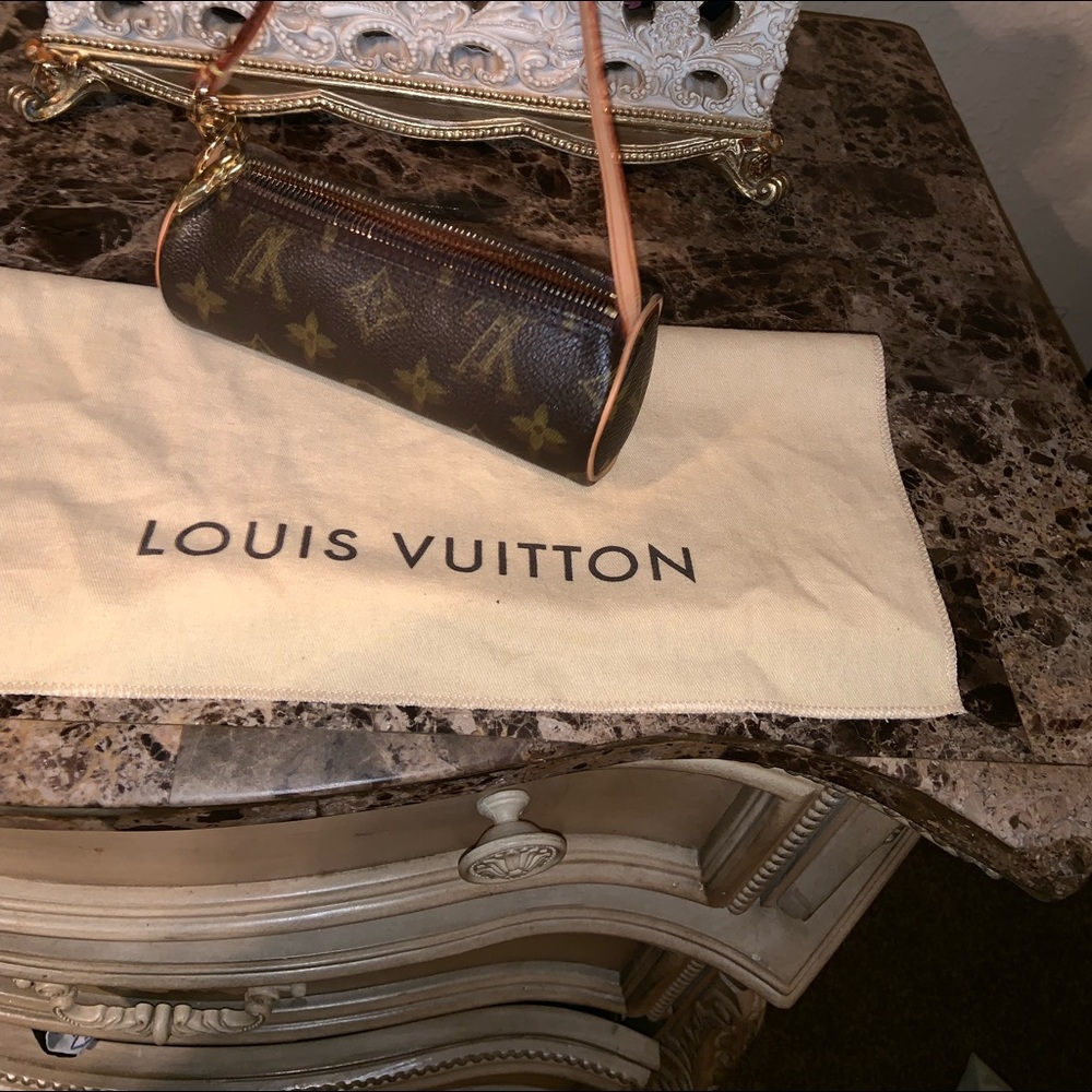 Authentic Louis Vuitton petite wristlet